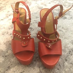 Never worn Red studded heels